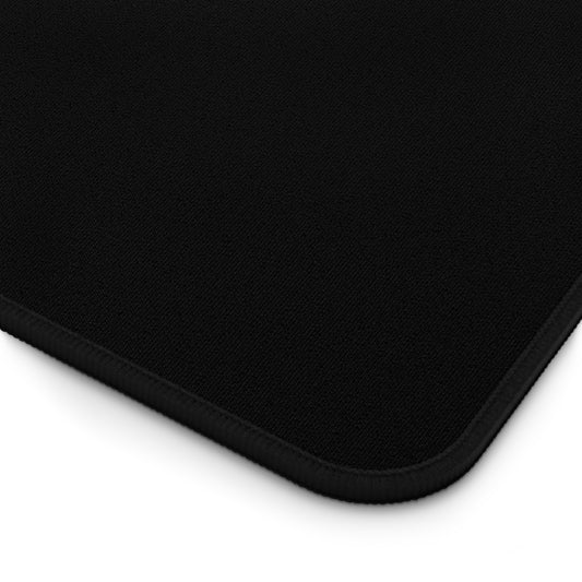 Close-up of a black mouse pad with a textured front surface.